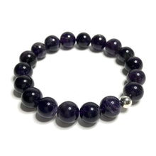 Load image into Gallery viewer, A handmade 10mm amethyst beaded stretch bracelet.
