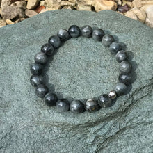 Load image into Gallery viewer, Blue Tiger&#39;s eye beaded bracelet on stone
