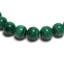Load image into Gallery viewer, Close up of malachite beads

