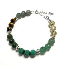 Load image into Gallery viewer, Abundance bracelet showing 6 different crystals separated by silver beads
