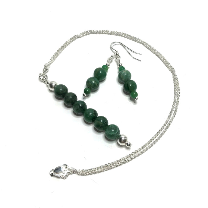 Handmade African jade bead pendant with a pair of matching drop earrings.