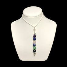 Load image into Gallery viewer, Calming healing crystal pendant necklace on white stand

