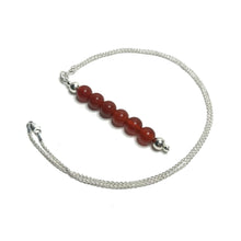 Load image into Gallery viewer, Carnelian pendant on a silver chain
