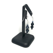 Load image into Gallery viewer, Dumortierite dangle earrings on stand

