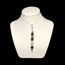 Load image into Gallery viewer, Empath proctection crystal pendant on stand
