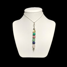 Load image into Gallery viewer, Love crystal pendant on stand
