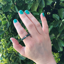 Load image into Gallery viewer, Hand wearing moss agate gemstone ring
