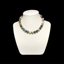 Load image into Gallery viewer, Ocean jasper necklace on a white stand
