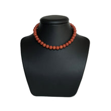 Load image into Gallery viewer, Red jasper crystal choker on stand
