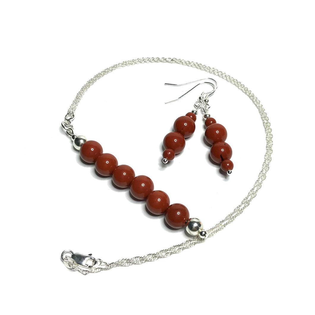 Red jasper pendant with matching crystal earrings