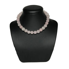Load image into Gallery viewer, Rose quartz crystal neckace on stand
