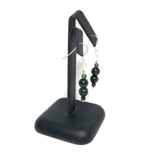 Load image into Gallery viewer, Ruby zoisite dangle earrings on stand
