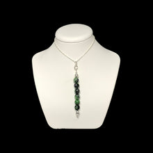 Load image into Gallery viewer, Ruby zoisite pendant necklace on stand
