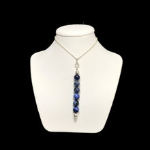 Load image into Gallery viewer, Sodalite crystal pendant on stand

