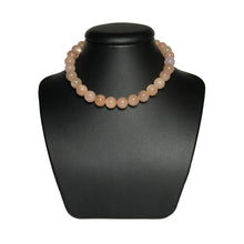 Load image into Gallery viewer, Sunstone beaded necklace on stand
