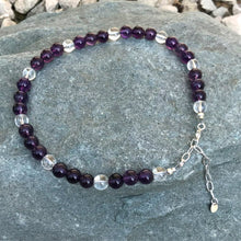 Load image into Gallery viewer, Purple gemstone anklet on stone
