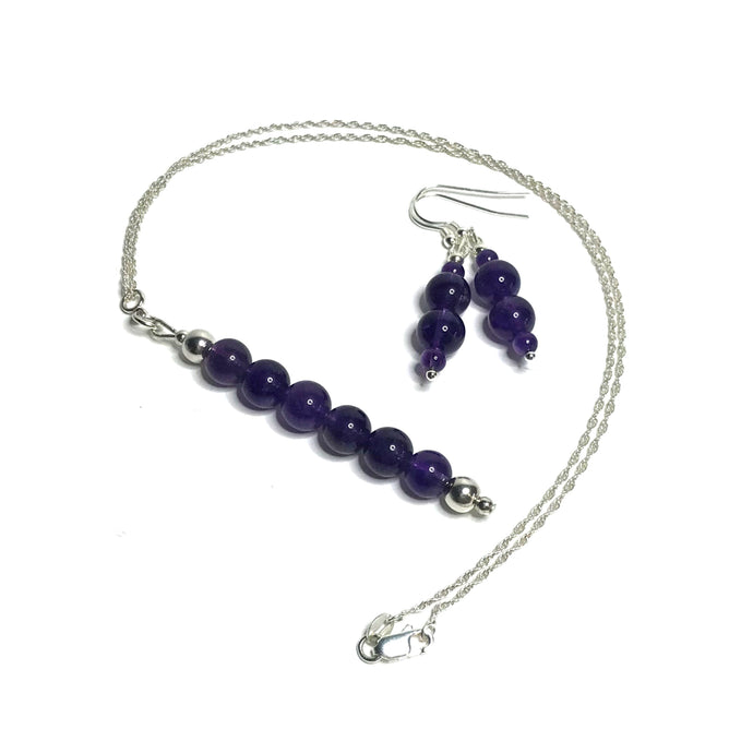 A matching set of beaded amethyst earrings and pendant with sterling silver beads, hooks and chain.
