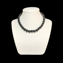 Load image into Gallery viewer, Hematite beaded necklace on stand

