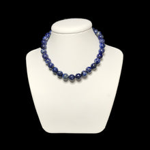 Load image into Gallery viewer, Lapis lazuli crystal necklace on stand

