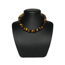 Load image into Gallery viewer, Tiger&#39;s eye beaded necklace on stand
