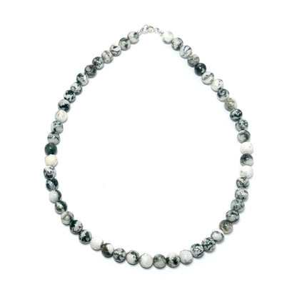 Tree Agate necklace on a white background