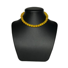 Load image into Gallery viewer, Yellow agate choker on stand
