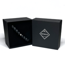 Load image into Gallery viewer, Handmade 10mm matte onyx bracelet in a black gift box
