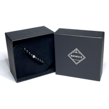 Load image into Gallery viewer, Handmade 6mm matte onyx bracelet in a black gift box
