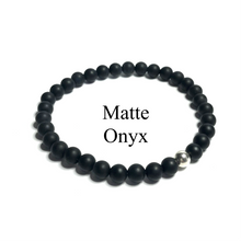 Load image into Gallery viewer, Handmade 6mm matte onyx bracelet on white background labelled with the word matte onyx
